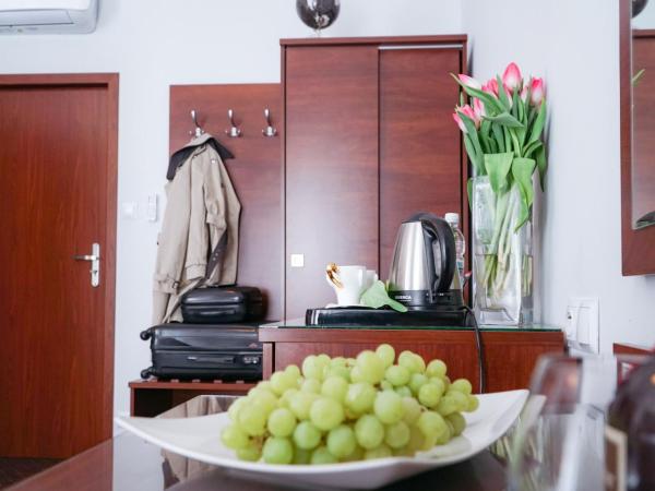 City Center Rooms Piotrkowska 91 : photo 3 de la chambre chambre double ou lits jumeaux