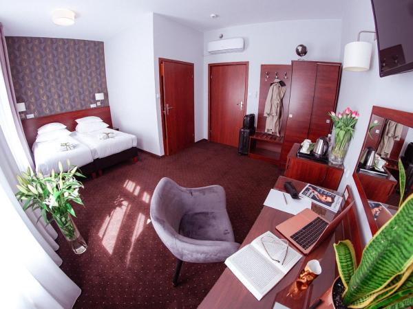 City Center Rooms Piotrkowska 91 : photo 5 de la chambre chambre double ou lits jumeaux