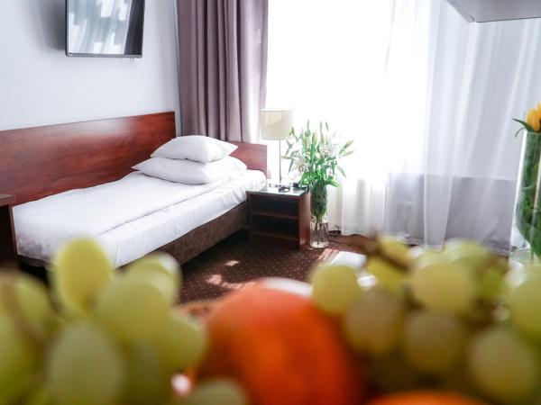 City Center Rooms Piotrkowska 91 : photo 6 de la chambre chambre triple