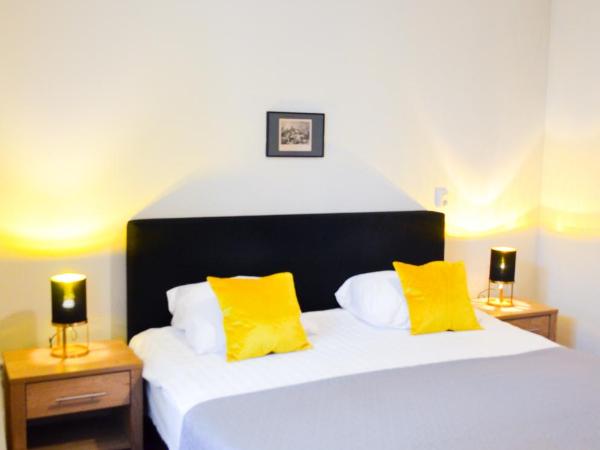 Family Hotel Kooyk : photo 5 de la chambre chambre double ou lits jumeaux supérieure avec salle de bains privative - vue sur jardin