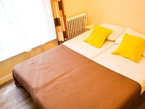 Family Hotel Kooyk : photo 5 de la chambre chambre lits jumeaux avec salle de bains commune