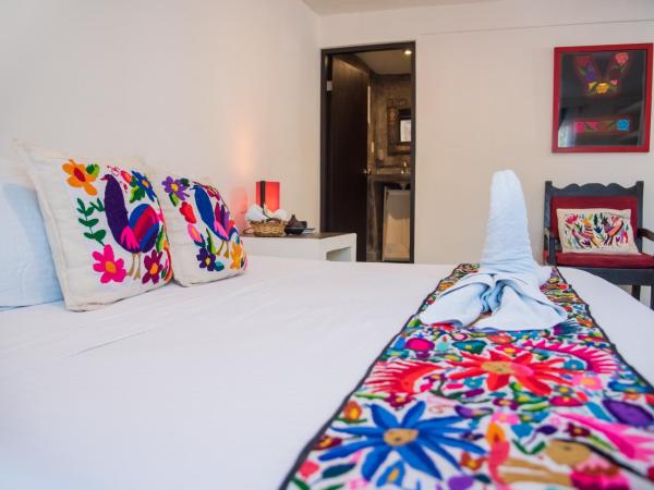 Tres Mentiras Boutique Hotel : photo 5 de la chambre chambre lit king-size avec balcon