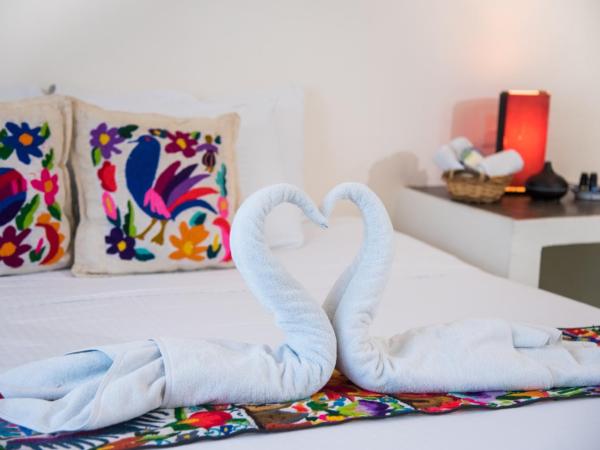 Tres Mentiras Boutique Hotel : photo 10 de la chambre chambre lit king-size avec balcon