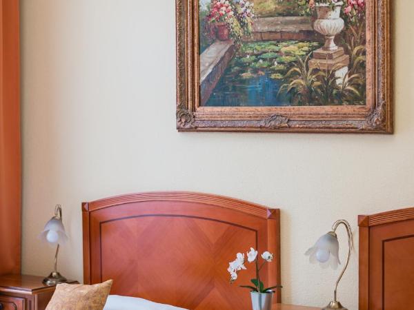 City Hotel UNIO superior : photo 9 de la chambre chambre simple