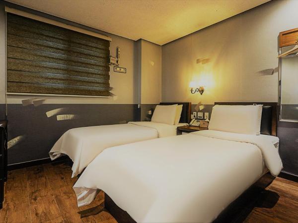 Friendly DH Naissance Hotel by Mindrum Group : photo 4 de la chambre chambre lits jumeaux Économique - petit-déjeuner inclus