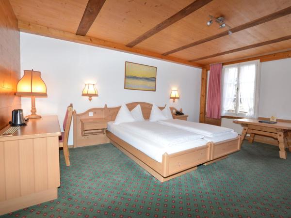 Hotel Chalet Swiss : photo 1 de la chambre chambre lits jumeaux standard
