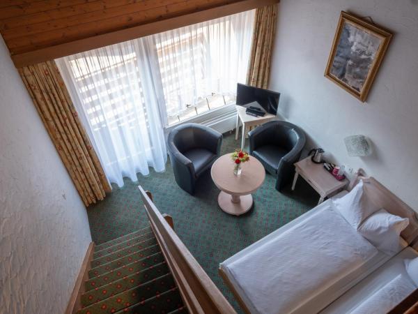 Hotel Chalet Swiss : photo 4 de la chambre chambre familiale (2 adultes et 2 enfants)
