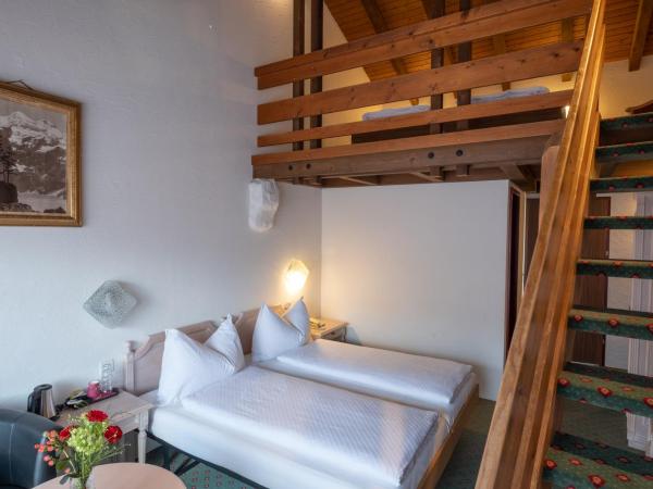 Hotel Chalet Swiss : photo 1 de la chambre chambre familiale (2 adultes et 2 enfants)