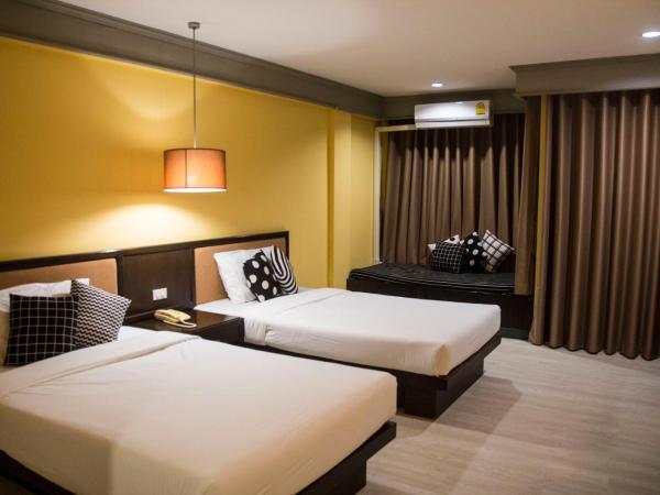 Aekpailin River Kwai Resort : photo 1 de la chambre chambre lits jumeaux supérieure - vue sur jardin