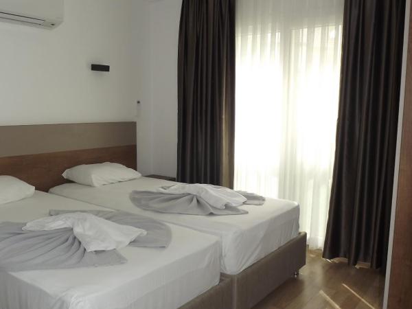 Opus Apart Hotel : photo 7 de la chambre chambre familiale - vue sur jardin
