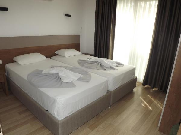 Opus Apart Hotel : photo 10 de la chambre chambre familiale - vue sur jardin
