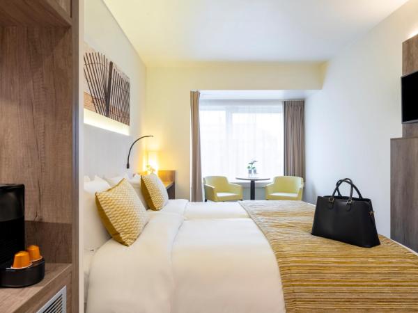 Mercure Oostende : photo 6 de la chambre chambre lits jumeaux supérieure avec 2 lits séparés