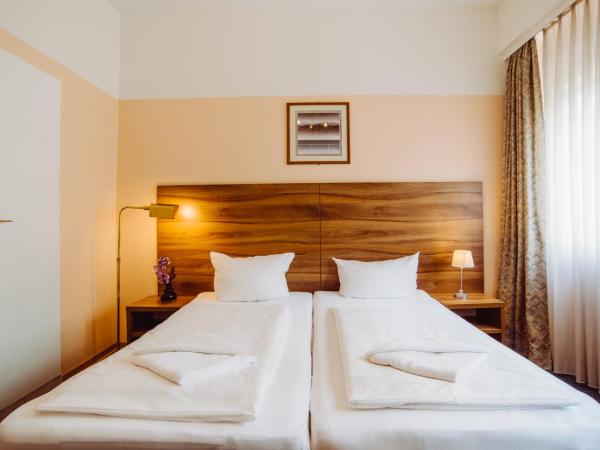 Alper Hotel am Potsdamer Platz : photo 3 de la chambre chambre lits jumeaux