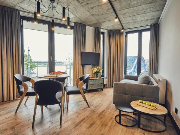 The Bridge Suites Hotel : photo 3 de la chambre corner room with river view