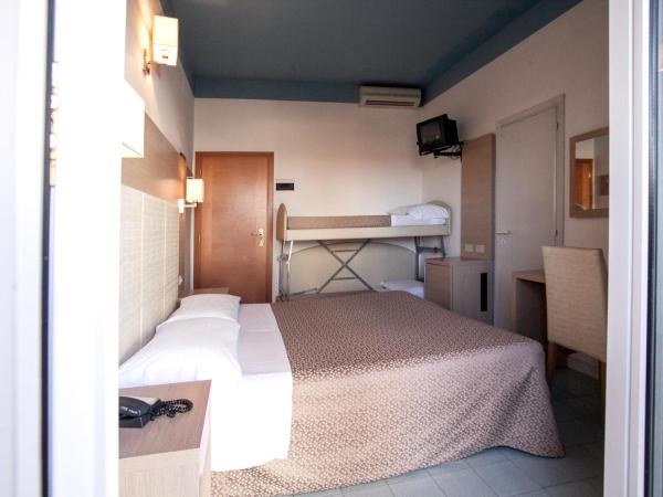 Hotel Fra I Pini : photo 9 de la chambre chambre quadruple confort