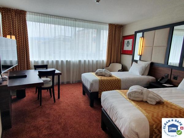 Nash Suites Airport Hotel : photo 1 de la chambre suite supérieure lits jumeaux