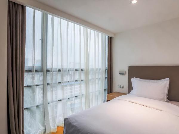 Holiday Inn Express Chengdu Xindu, an IHG Hotel : photo 1 de la chambre feature family room - non-smoking