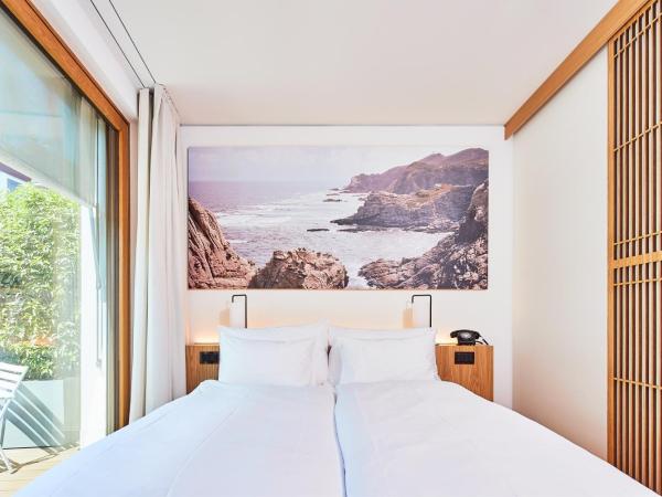 ART HOUSE Basel - Member of Design Hotels : photo 2 de la chambre petite chambre double lit queen-size avec terrasse