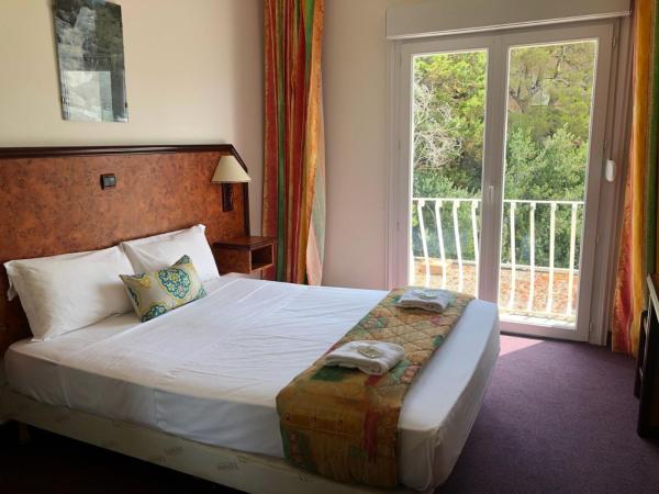 Hotel Madame Mere : photo 4 de la chambre chambre lits jumeaux - côté piscine