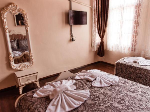 Lily Town Hotel : photo 5 de la chambre chambre triple