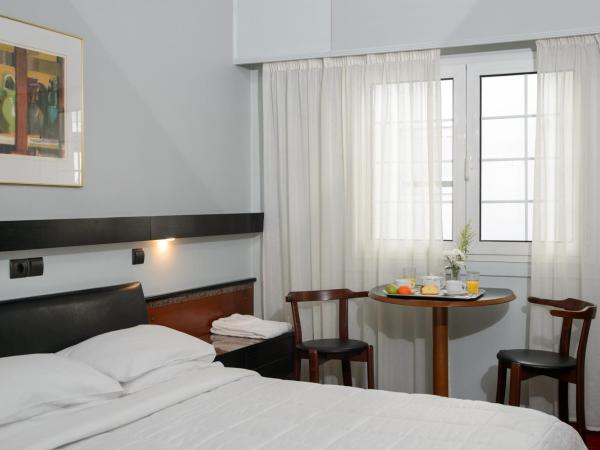 Victory Inn : photo 3 de la chambre petite chambre double