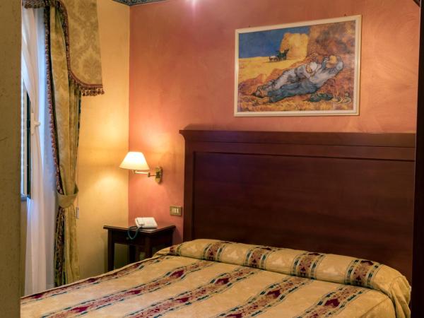 Hotel Joli : photo 1 de la chambre chambre double ou lits jumeaux