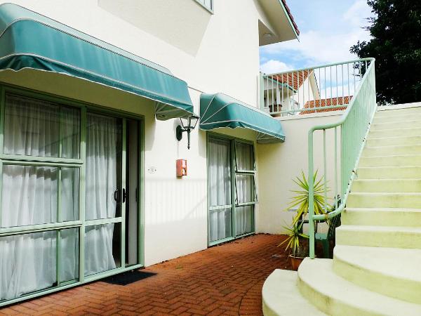 Rotorua Coachman Spa Motel : photo 1 de la chambre suite exécutive 1 chambre avec bain à remous