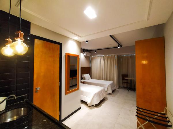 Savassi Village : photo 8 de la chambre chambre double ou lits jumeaux deluxe - vue sur ville