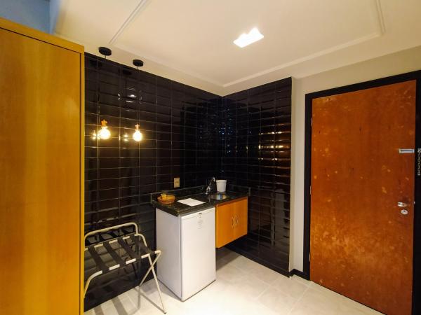 Savassi Village : photo 3 de la chambre chambre double ou lits jumeaux deluxe - vue sur ville