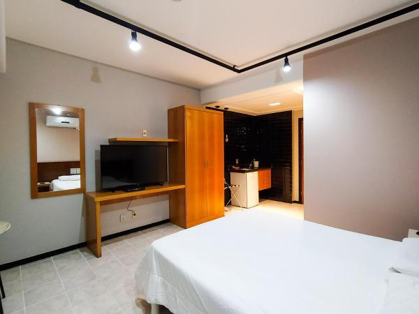 Savassi Village : photo 5 de la chambre chambre double ou lits jumeaux deluxe - vue sur ville