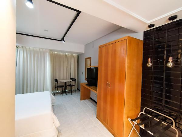 Savassi Village : photo 6 de la chambre chambre double ou lits jumeaux deluxe - vue sur ville