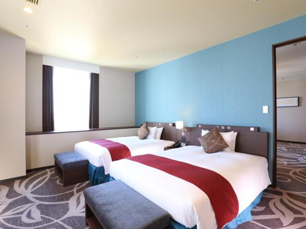 Quintessa Hotel Osaka Bay : photo 1 de la chambre suite d'angle avec 2 lits doubles