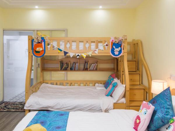 Nancy Guesthouse : photo 9 de la chambre chambre deluxe avec 2 lits queen-size