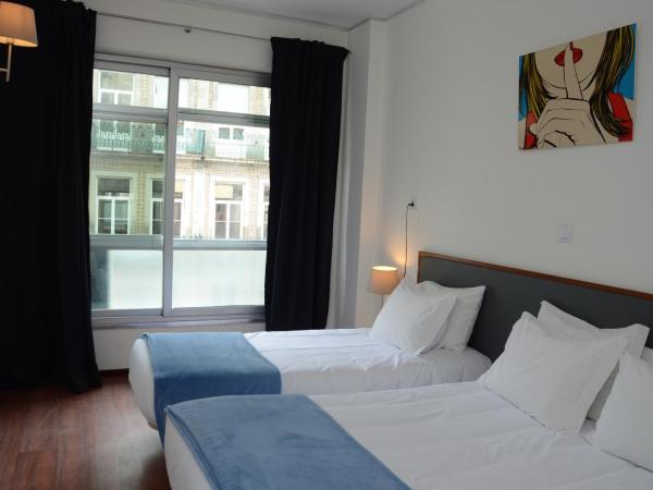 Hotel Girassol : photo 3 de la chambre chambre triple