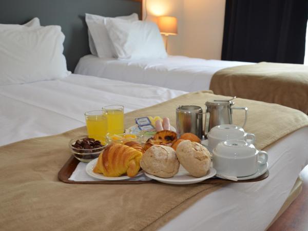 Hotel Girassol : photo 3 de la chambre chambre familiale (4 adultes)