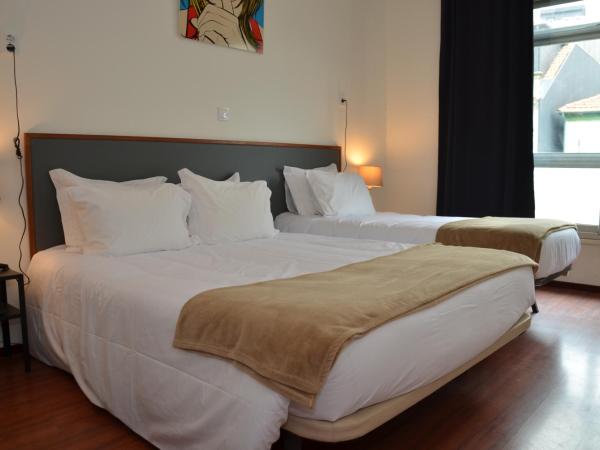 Hotel Girassol : photo 1 de la chambre chambre familiale (4 adultes)