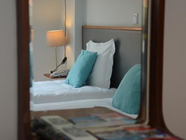 Hotel Girassol : photo 2 de la chambre chambre lits jumeaux