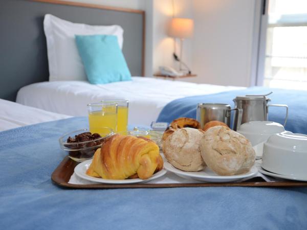 Hotel Girassol : photo 1 de la chambre chambre lits jumeaux