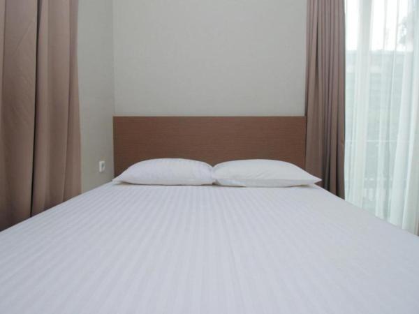 Home 899 Patal Senayan : photo 6 de la chambre chambre lits jumeaux standard