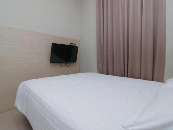 Home 899 Patal Senayan : photo 8 de la chambre chambre lits jumeaux standard