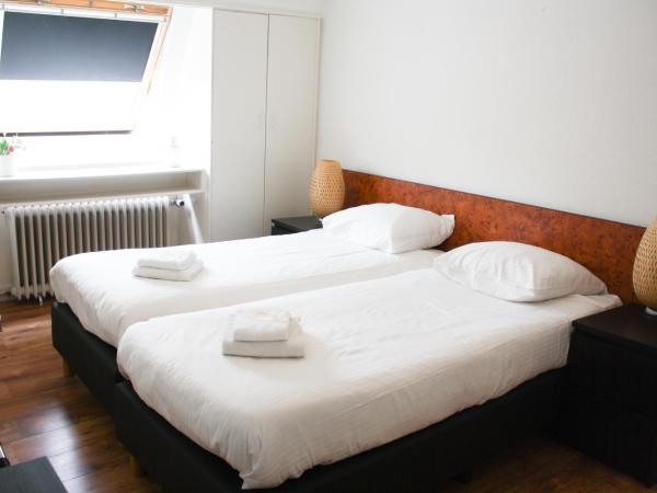 Hotel Benno : photo 1 de la chambre chambre lits jumeaux avec toilettes communes