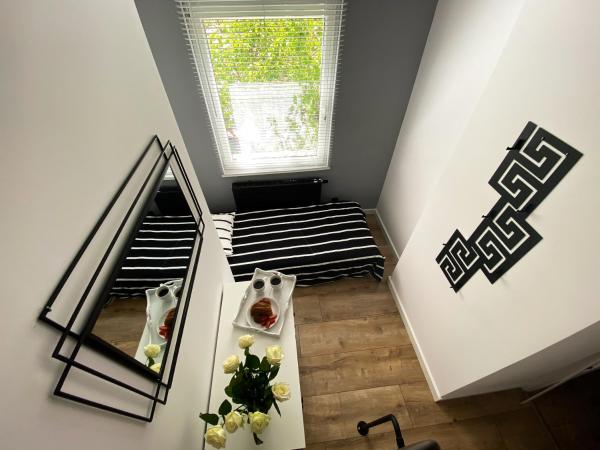 Hostel 19 Sopot : photo 1 de la chambre chambre triple avec mezzanine