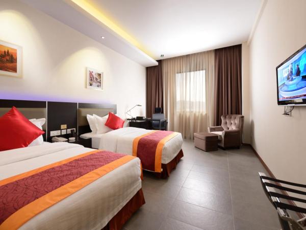 E-RED HOTEL KUANTAN : photo 5 de la chambre chambre lits jumeaux deluxe