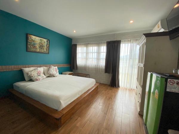 Norn-Nanta House : photo 2 de la chambre chambre double avec balcon