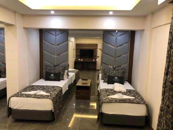 Venus Hotel : photo 3 de la chambre chambre quadruple