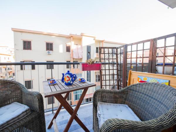 Casale D' Or : photo 2 de la chambre chambre triple avec balcon et salle de bains privative séparée