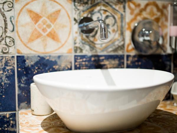 Casale D' Or : photo 7 de la chambre chambre triple avec balcon et salle de bains privative séparée