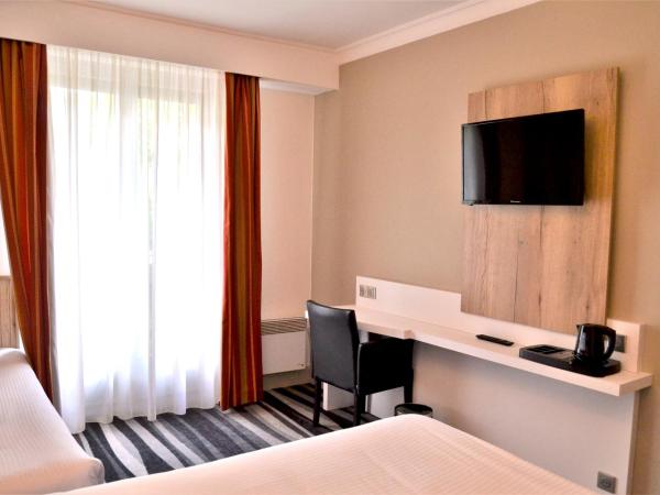 Kyriad Hotel Tours Centre : photo 3 de la chambre - 1 lit double + 1 lit simple 