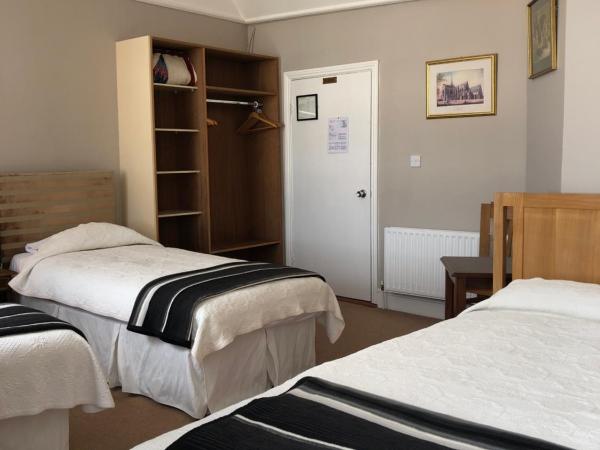 Harveys Guest House : photo 1 de la chambre chambre quadruple confort