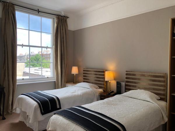 Harveys Guest House : photo 2 de la chambre chambre quadruple confort